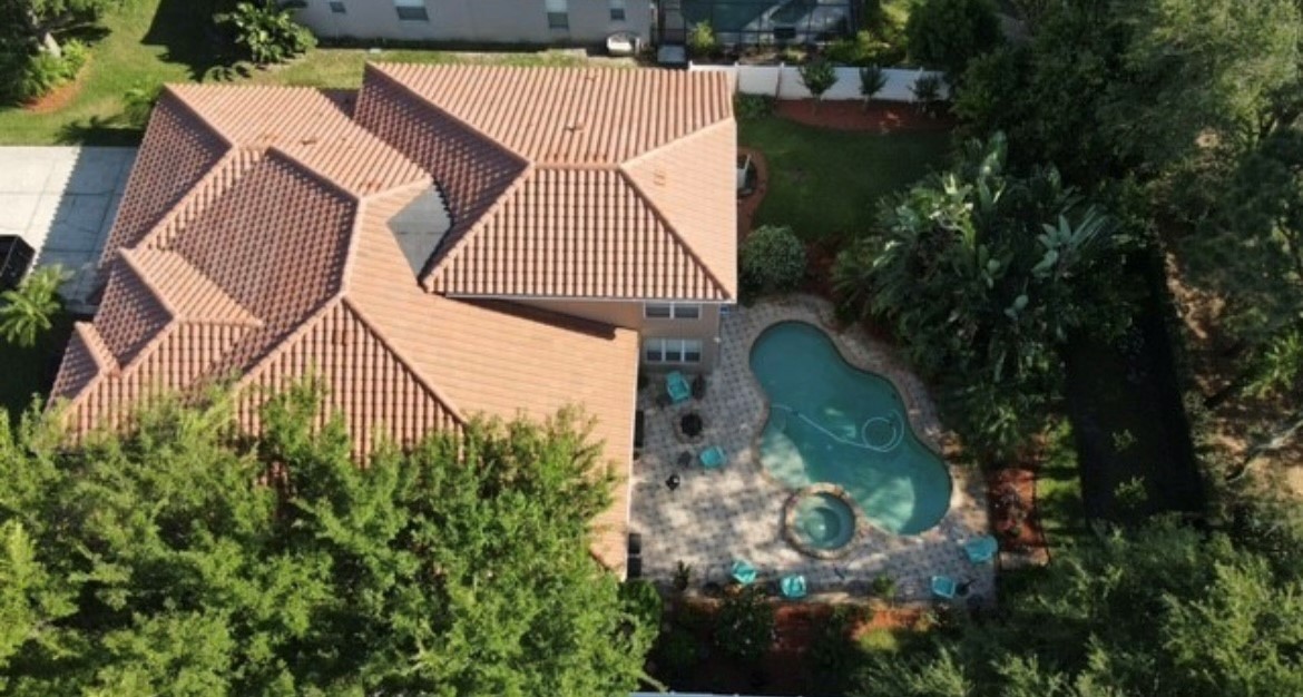 Tile roofing on a Florida home beside a swimming pool